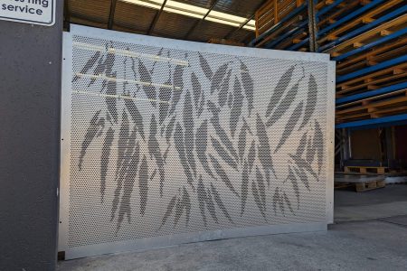 Gumleaf image to punch Decorative metal panel, created through precision CNC perforation for architectural and screening use